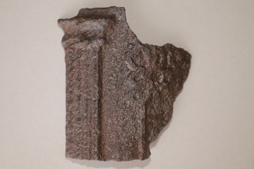Fragment einer gusseisernen Ofenplatte vom Gräfenberg