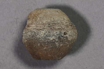 Spinnwirtel, um 1400, Fd.-Nr. 058, H. 2,05 cm, Br. 2,12 cm